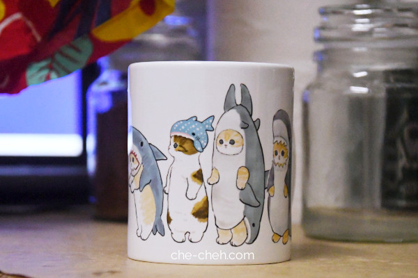 Cats In Shark Costumes Mug